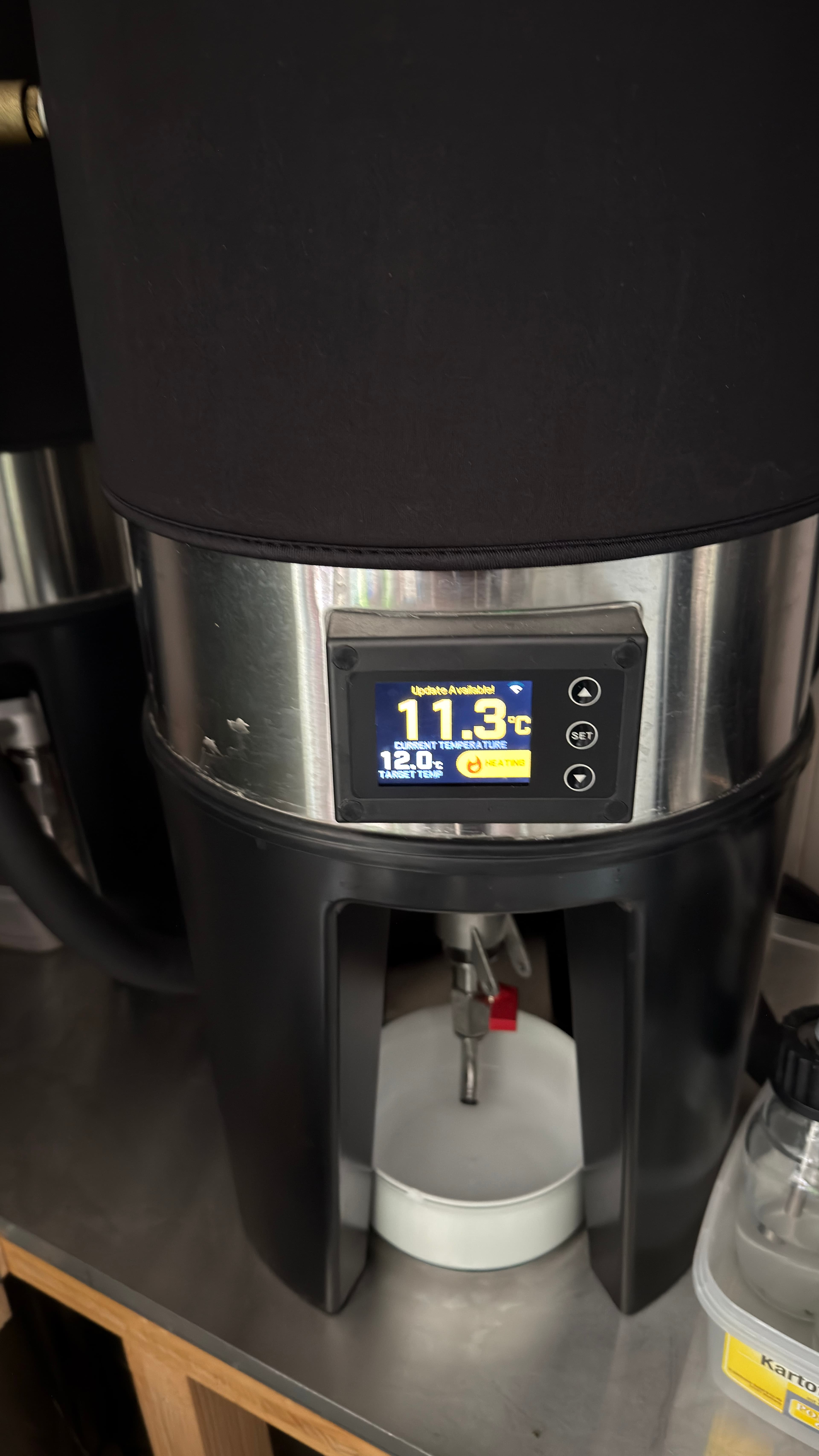 Grainfather fermenter display showing 11.3°C current temperature, 12.0°C target, heating active