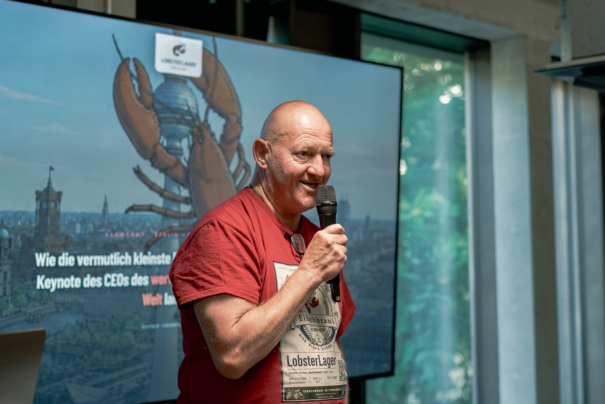 Gerhard Erschwendner speaking during the ClawCamp Berlin highlight session at CODE University